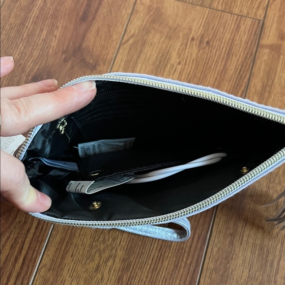 NWT Liz Claiborne Metallic Silver Phone Charging Wristlet with Tassel - Picture 6 of 9